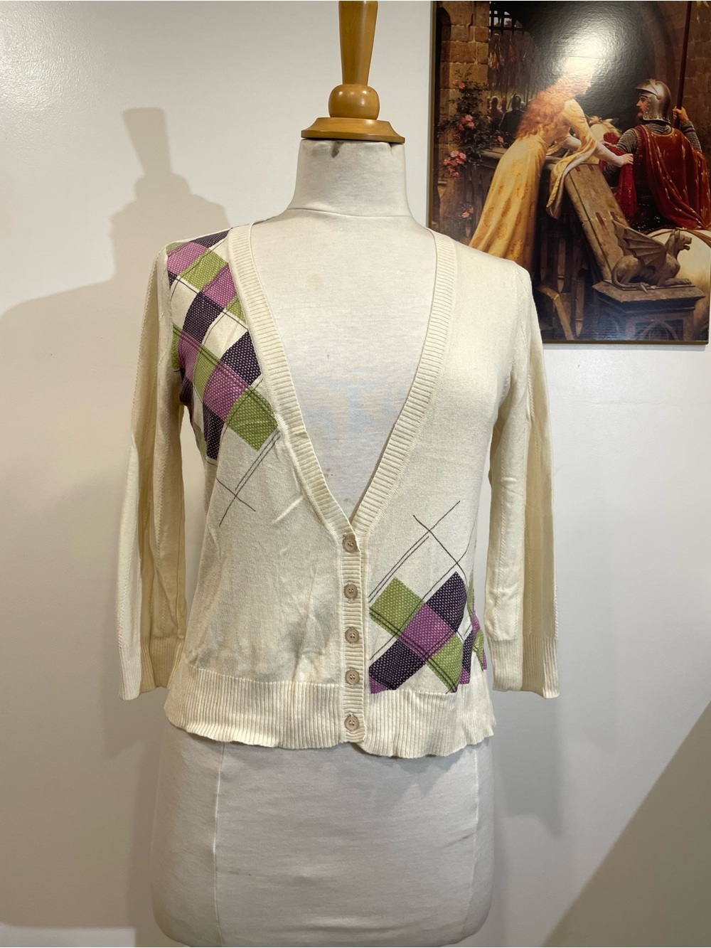 Cream V-neck 3/4 sleeve cardigan for fall with asymmetric argyle pattern